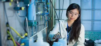 Chemical engineering student in a lab