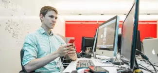 A student working in the office