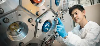 A student working on a machine