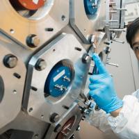 A student working on a machine